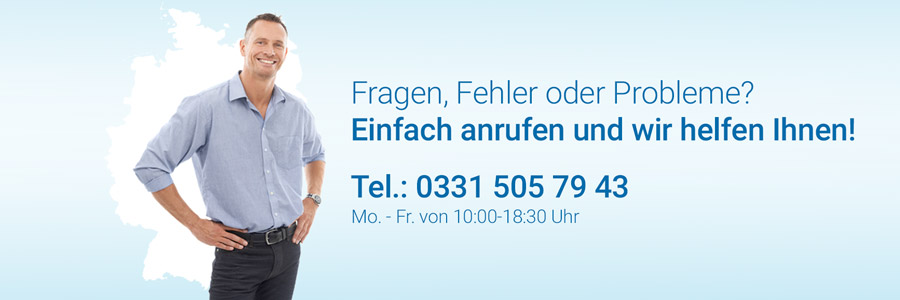 Freundlicher Service-Mitarbeiter mit aufgeschlossener Haltung – bereit, Ihre Fragen zu beantworten.